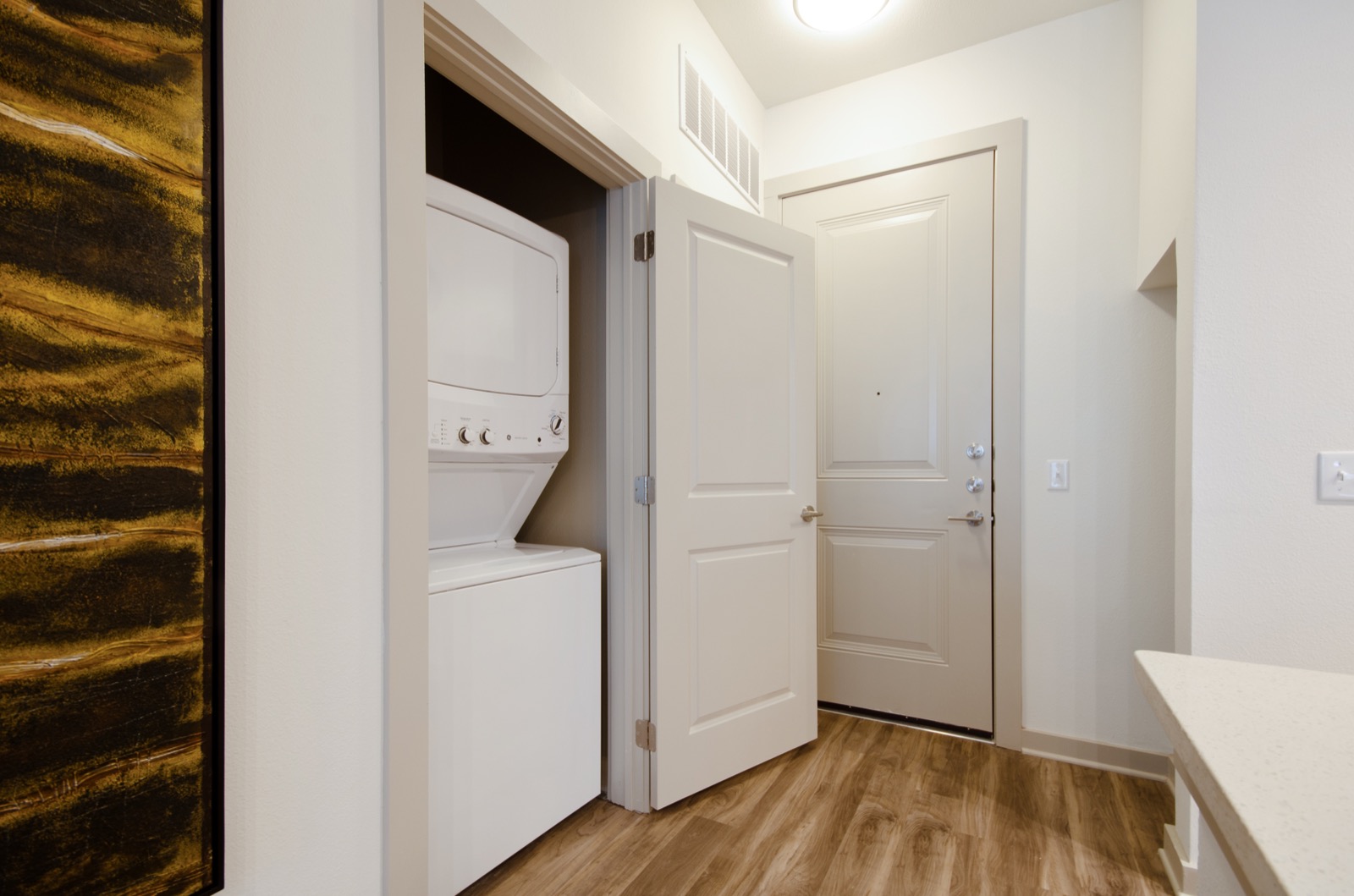 washer and dryer in a closet