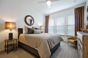Luxury Apartments Garland - Domain at the One Forty Luxury Bedroom With Lush Carpeting and Stylish Decor