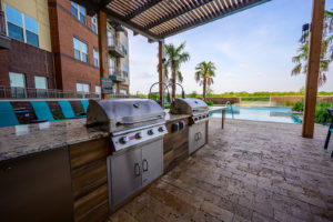 Apartments in Garland-Gorgeous Modern Outdoor Kitchen Complte With Granite Countertops and Two Stainless Steel Grills